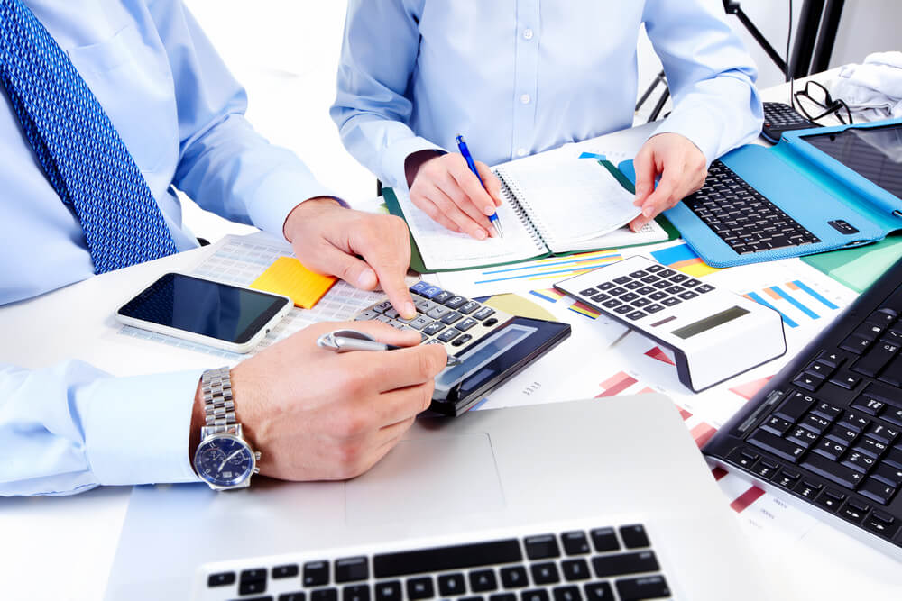 Two Men Doing Paperwork