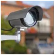 A cctv camera in front of a house.